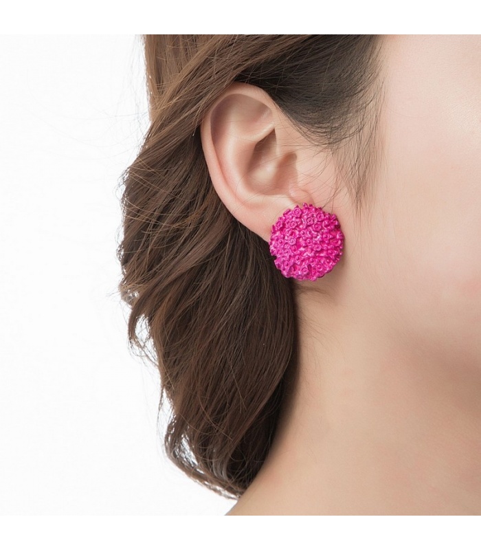 schending concept Prik Fuchsia roze oorclips met een mooie motief